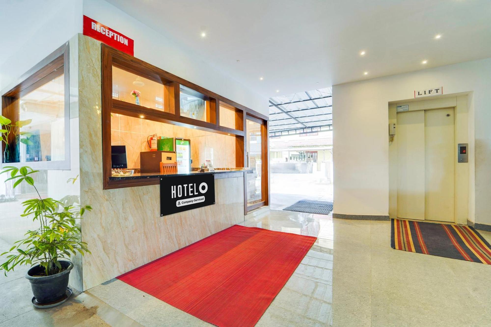 Super Hotel O Vazhakkala Kochi Bagian luar foto
